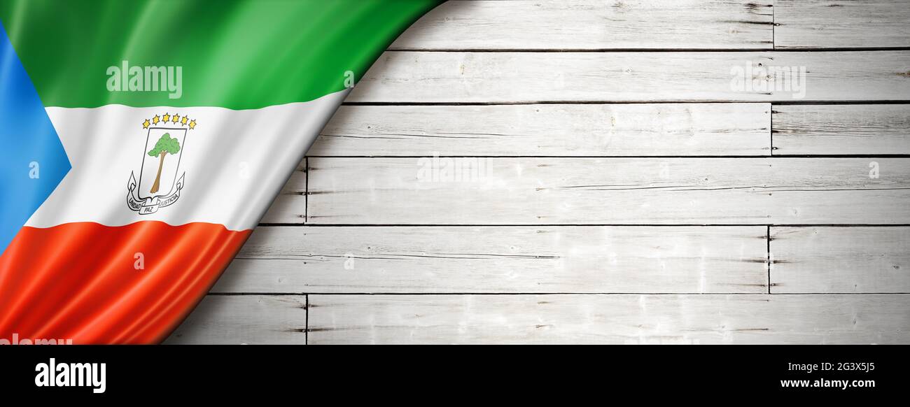 Equatorial Guinea flag on old white wall banner Stock Photo