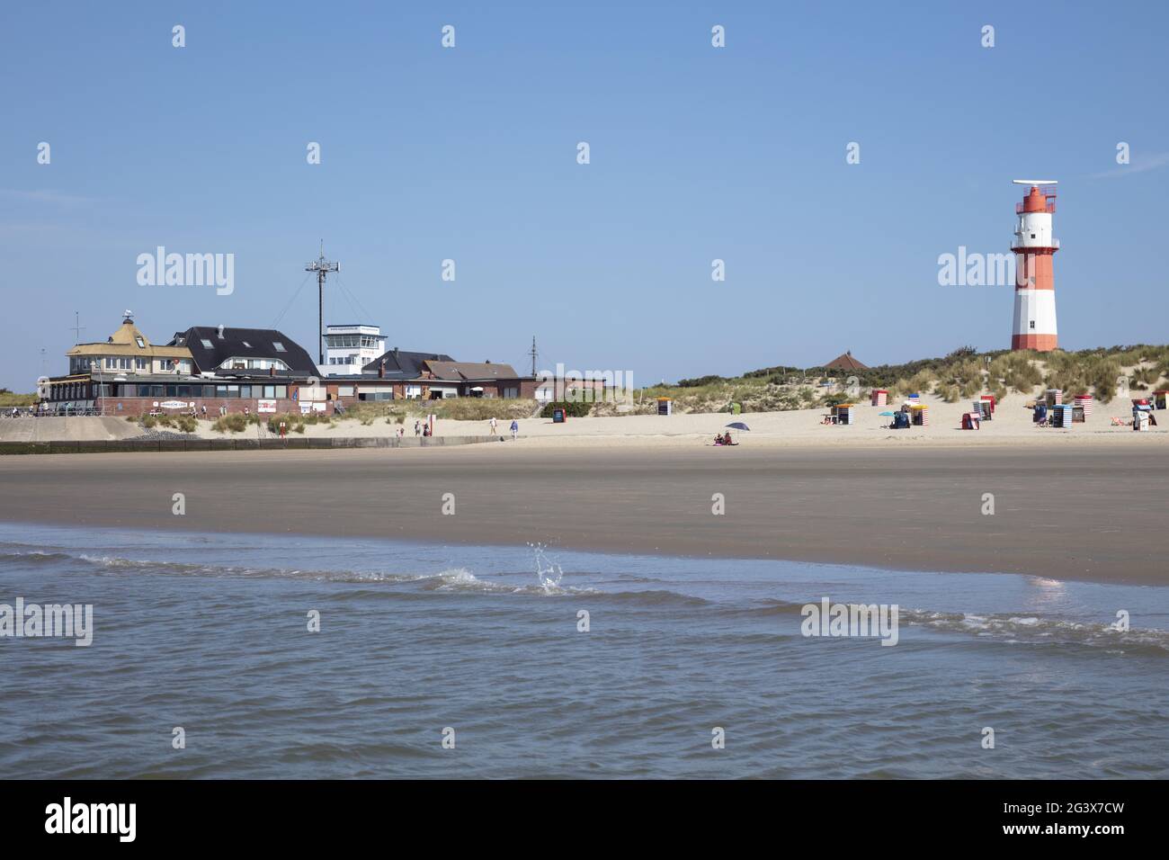South beach with electric Lighthouse at Borkum Island Stock Photo