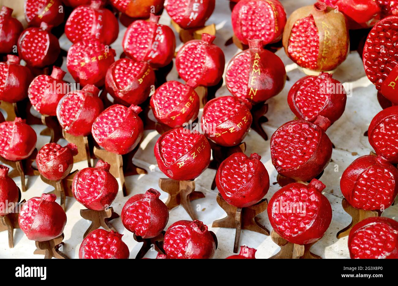 Rows of Wooden Pomegranate Ornaments, Armenian Souvenir for Sale at the Vernissage Market in Yerevan, Armenia Stock Photo