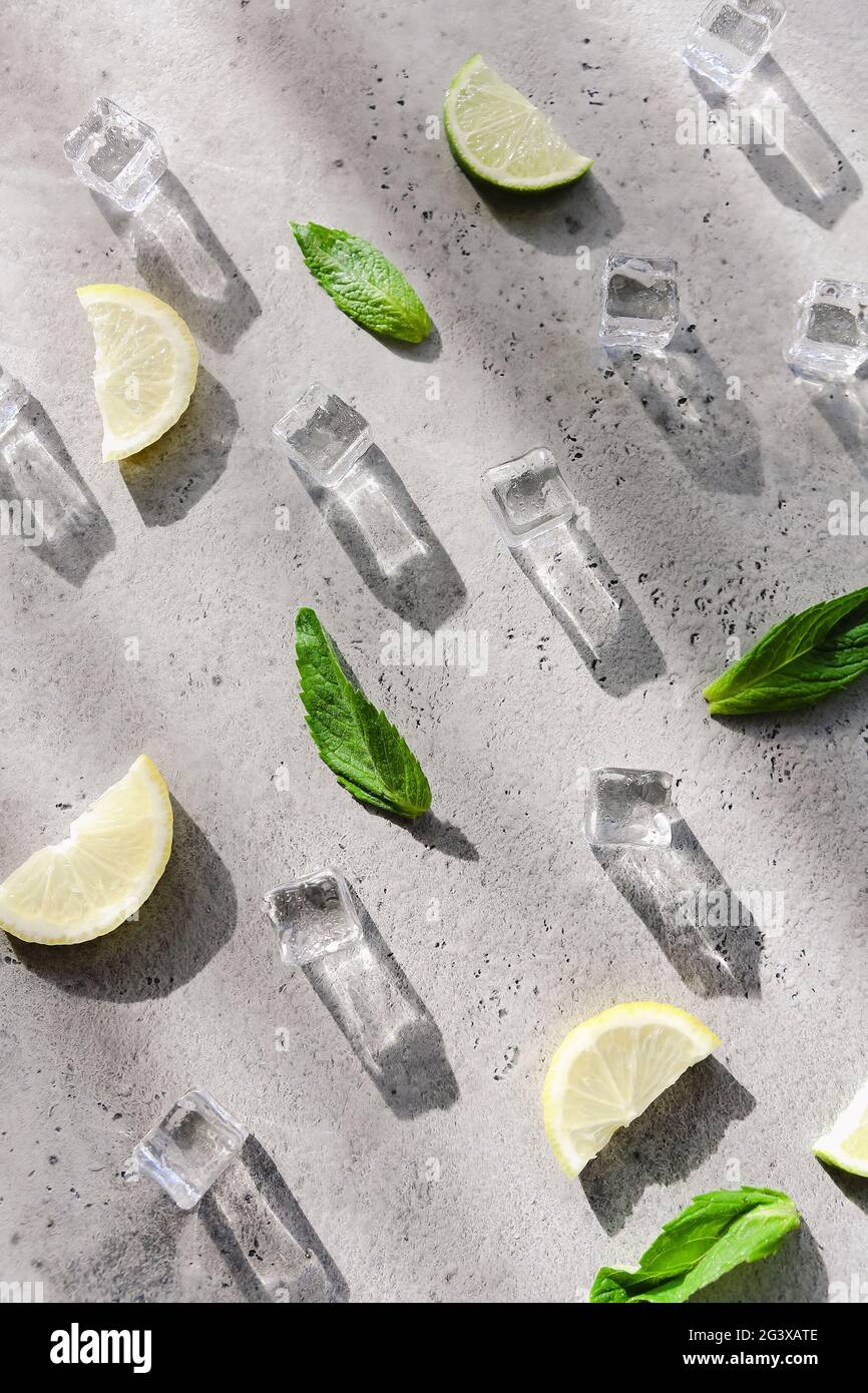 Mint leaves and ice cubes on table Stock Photo