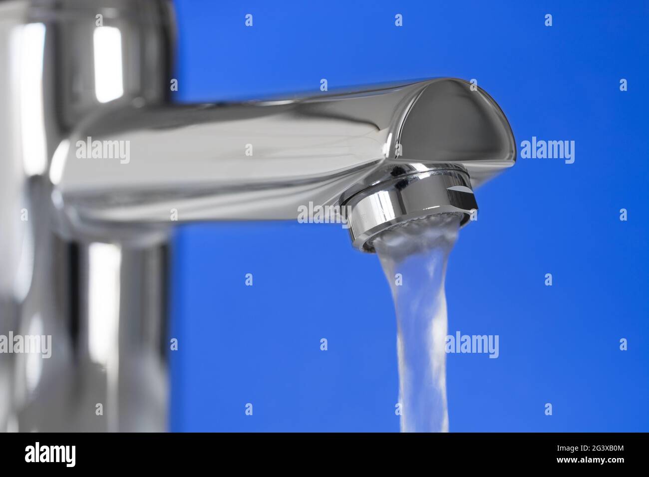 Water tap with water jet Stock Photo