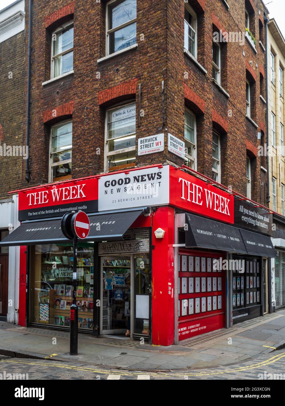 London Newsagent Soho London - Good News Newsagent on Berwick Street in London's Soho with advertising banner for the The Week magazine Stock Photo