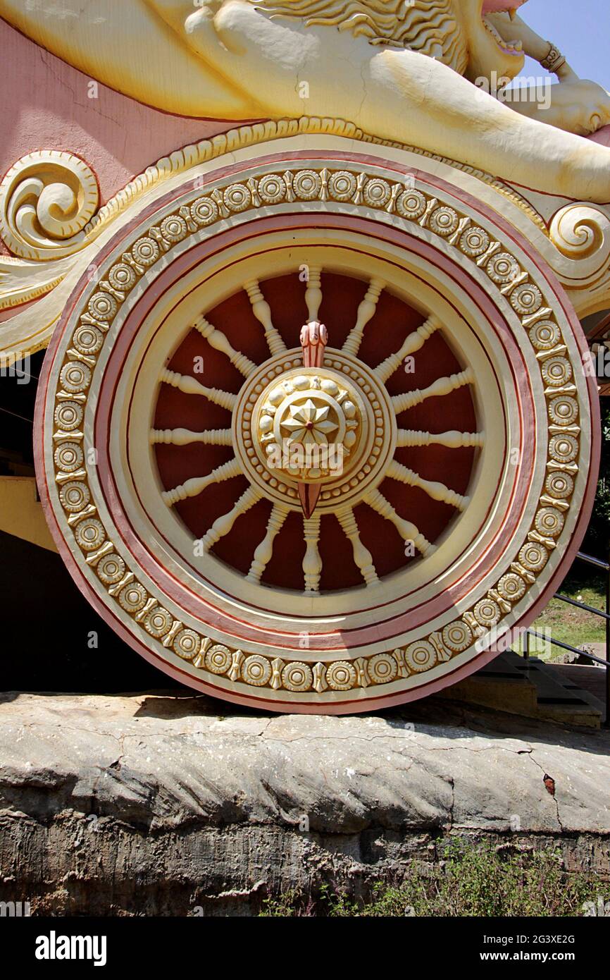 Sculptured Wheel of Chariot Stock Photo