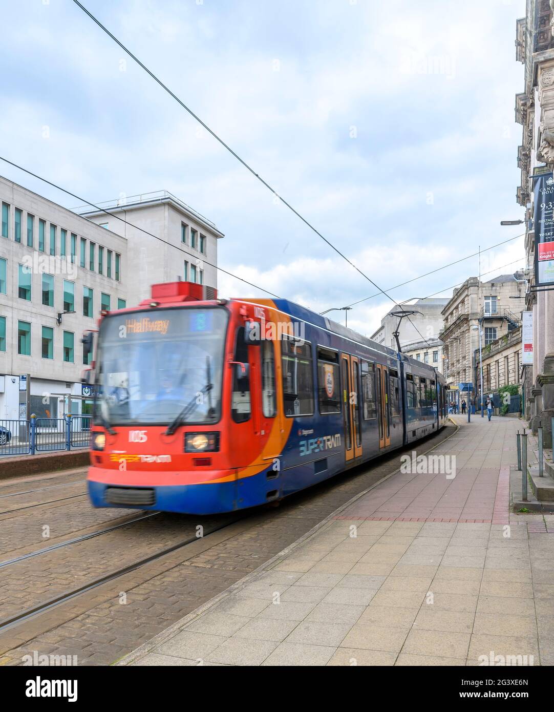 The modern tram service now runs past Park Hill estate in Sheffield built to replace Victorian slums. Urban Splash have brought Park Hill back to life Stock Photo