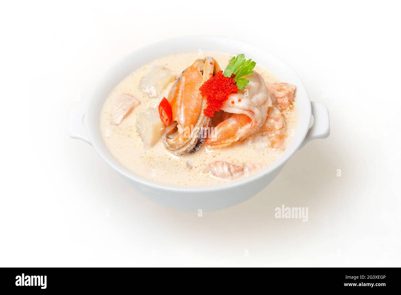 Traditional Japanese miso soup with seaweed and fish. Closeup, top