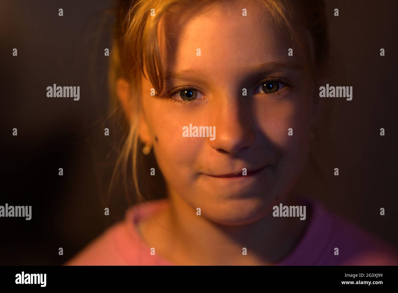 Close-up portrait of adorable little girl. Selective focus with shallow ...