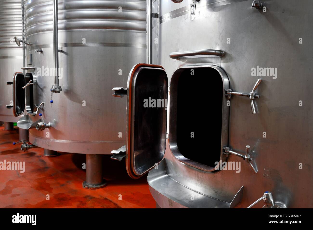 Industrial stainless steel vats in modern brewery Stock Photo Alamy