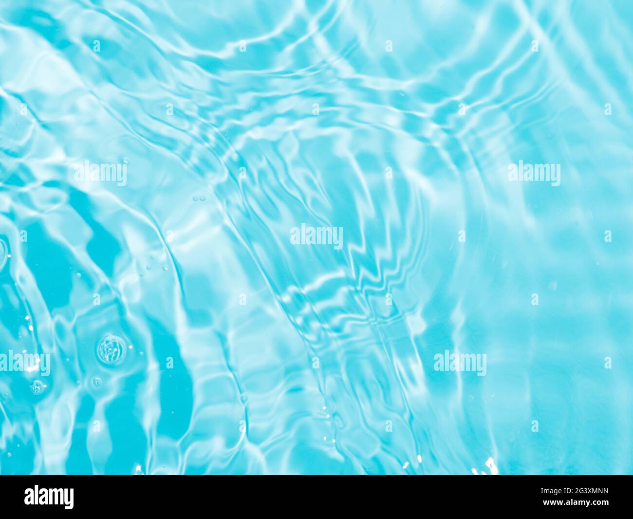 Ripple water texture with shadows on blue Stock Photo