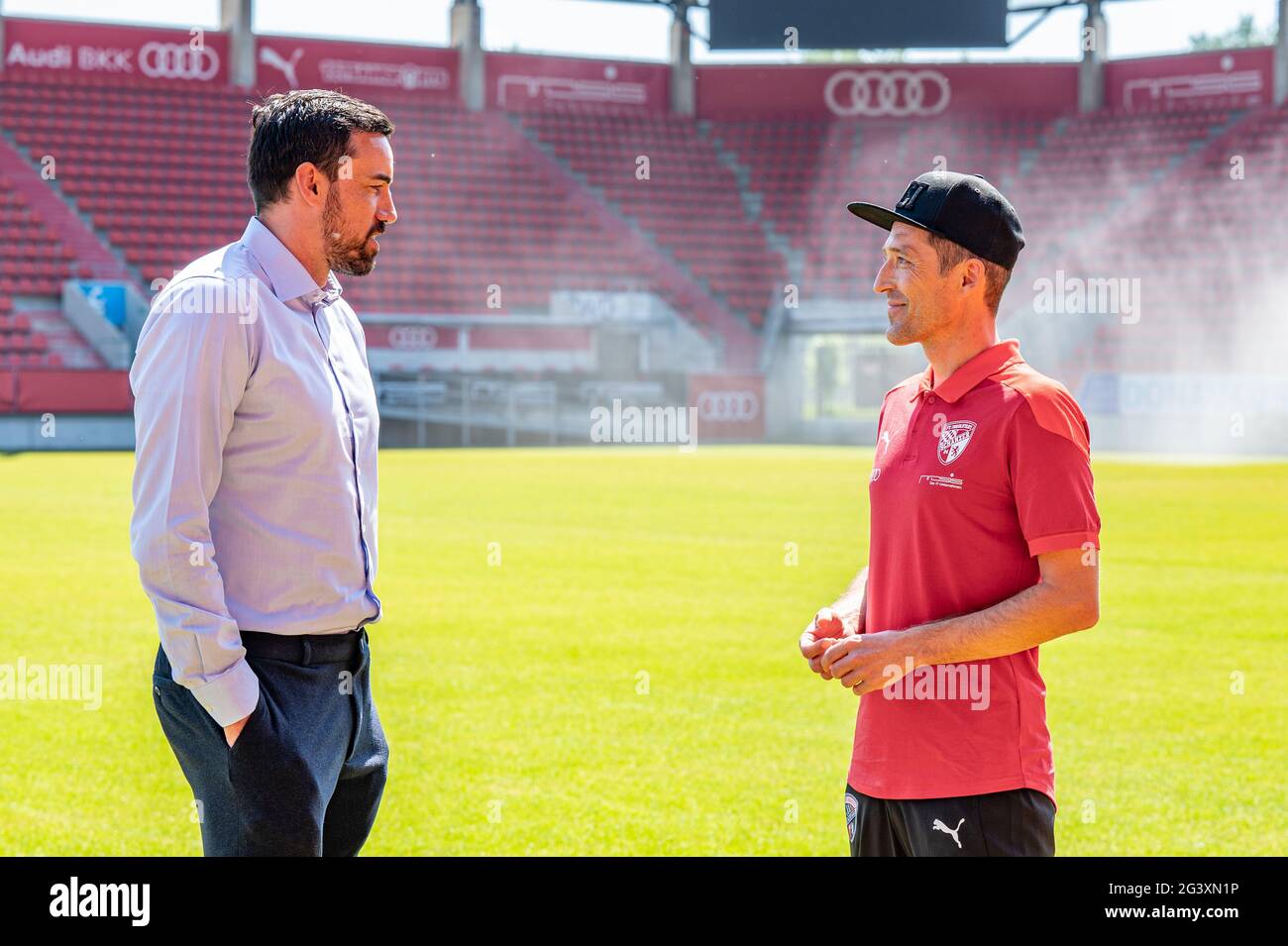 Ingolstadt, Germany. 18th June, 2021. Roberto Pätzold (r), the new coach at  FC Ingolstadt, talks to Malte Metzelder, "Manager Professional Football" at  FC Ingolstadt, at the football club's stadium. Credit: Armin  Weigel/dpa/Alamy