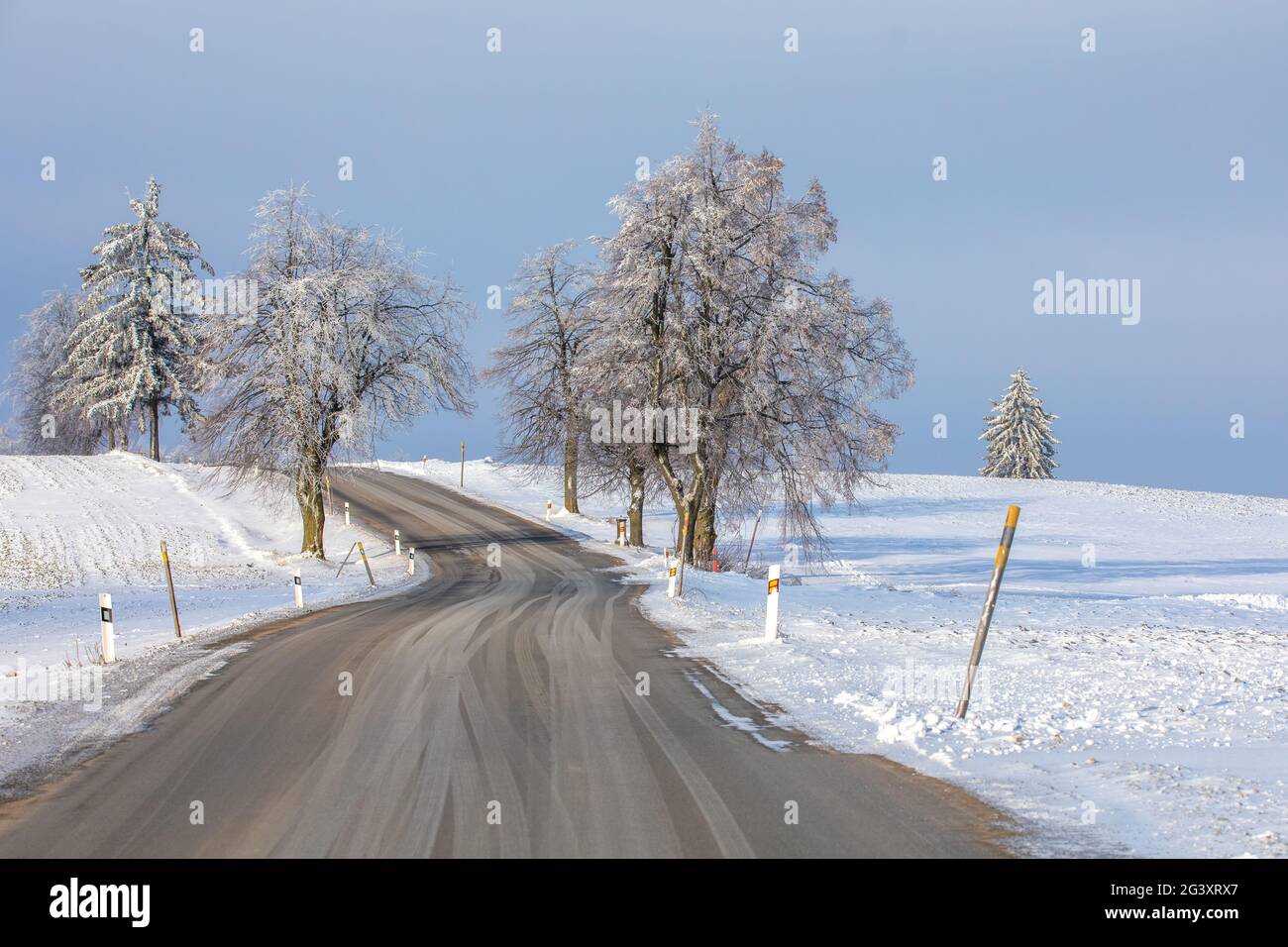 Winter landscape with road in highland Stock Photo