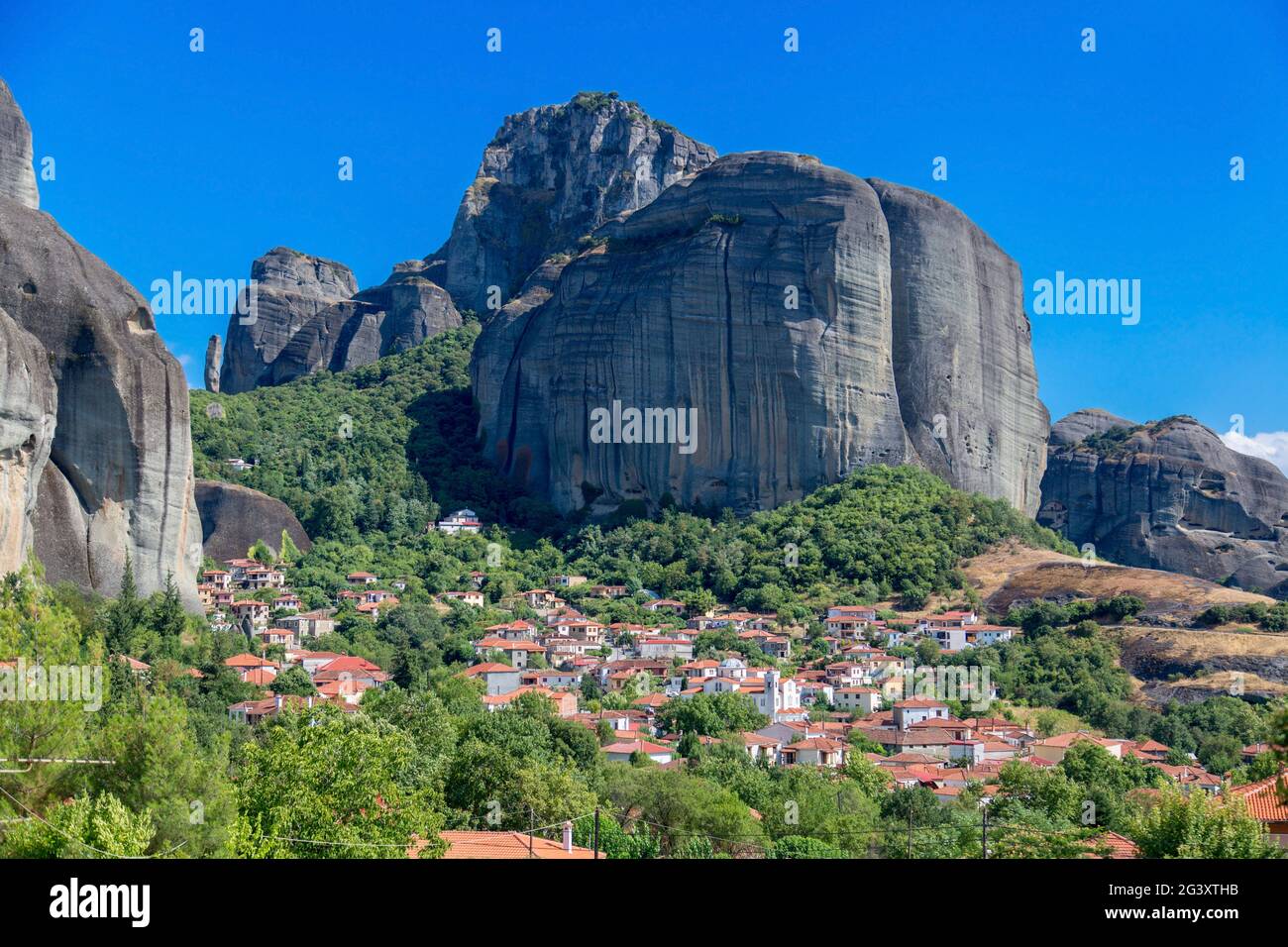 Christian monastery building on top of a hill in Meteora, Greece. Meteora is a UNESCO World Heritage Site due to its monastic bu Stock Photo