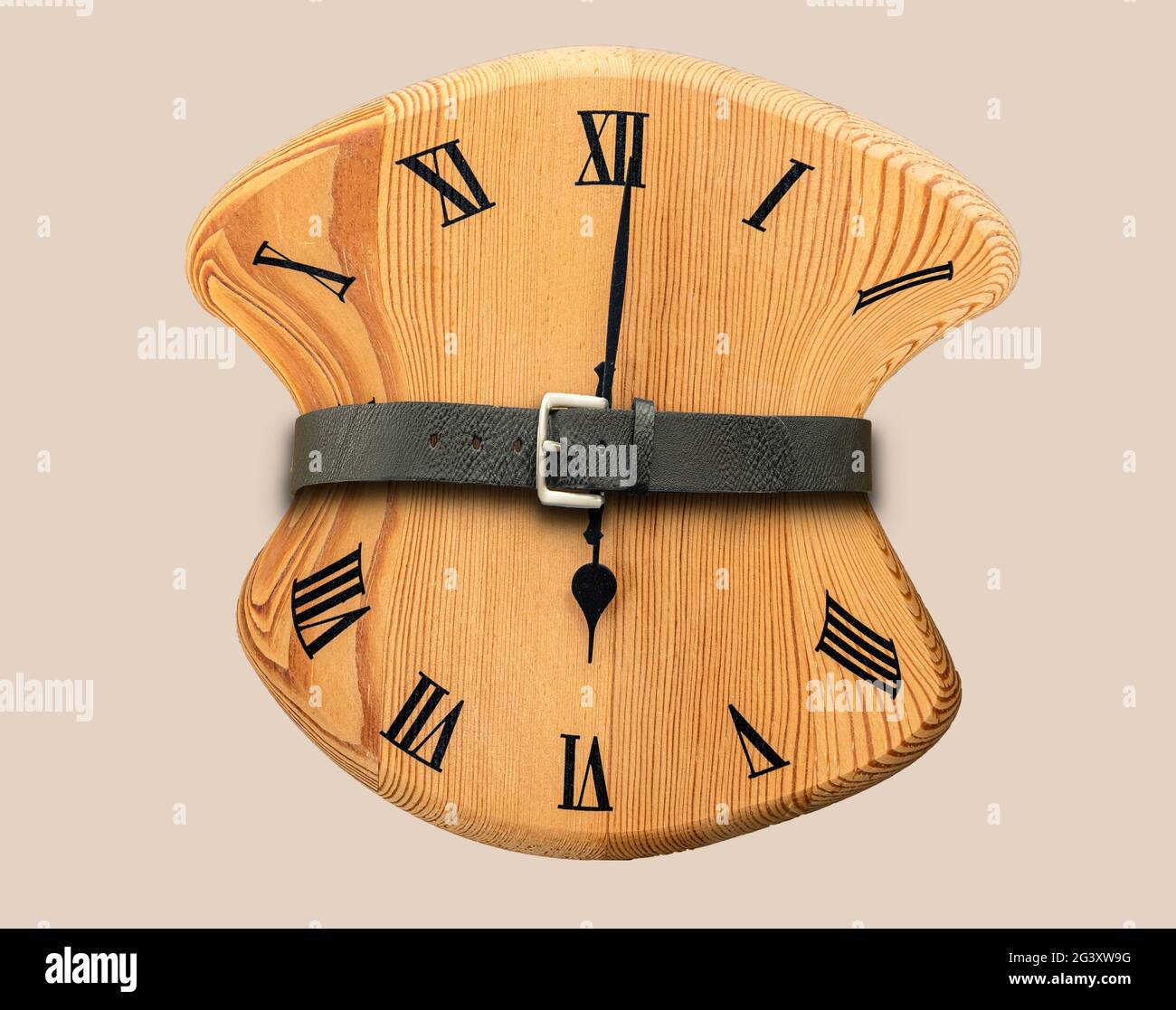 Tight for Time - Distorted Clock with belt pulled tight Stock Photo