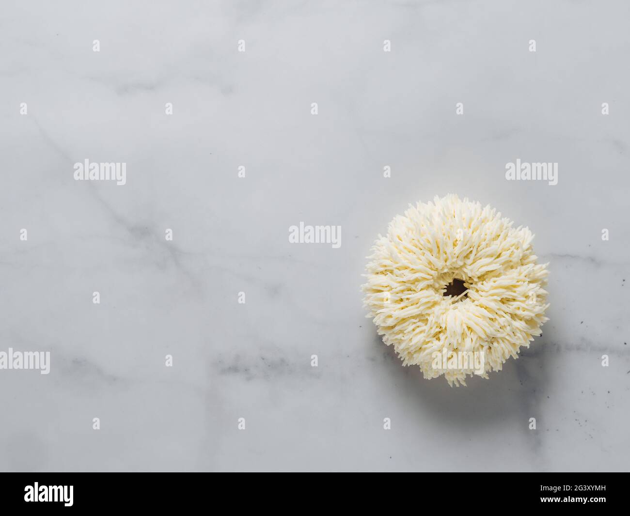 Shag donut on marble background, copy space Stock Photo
