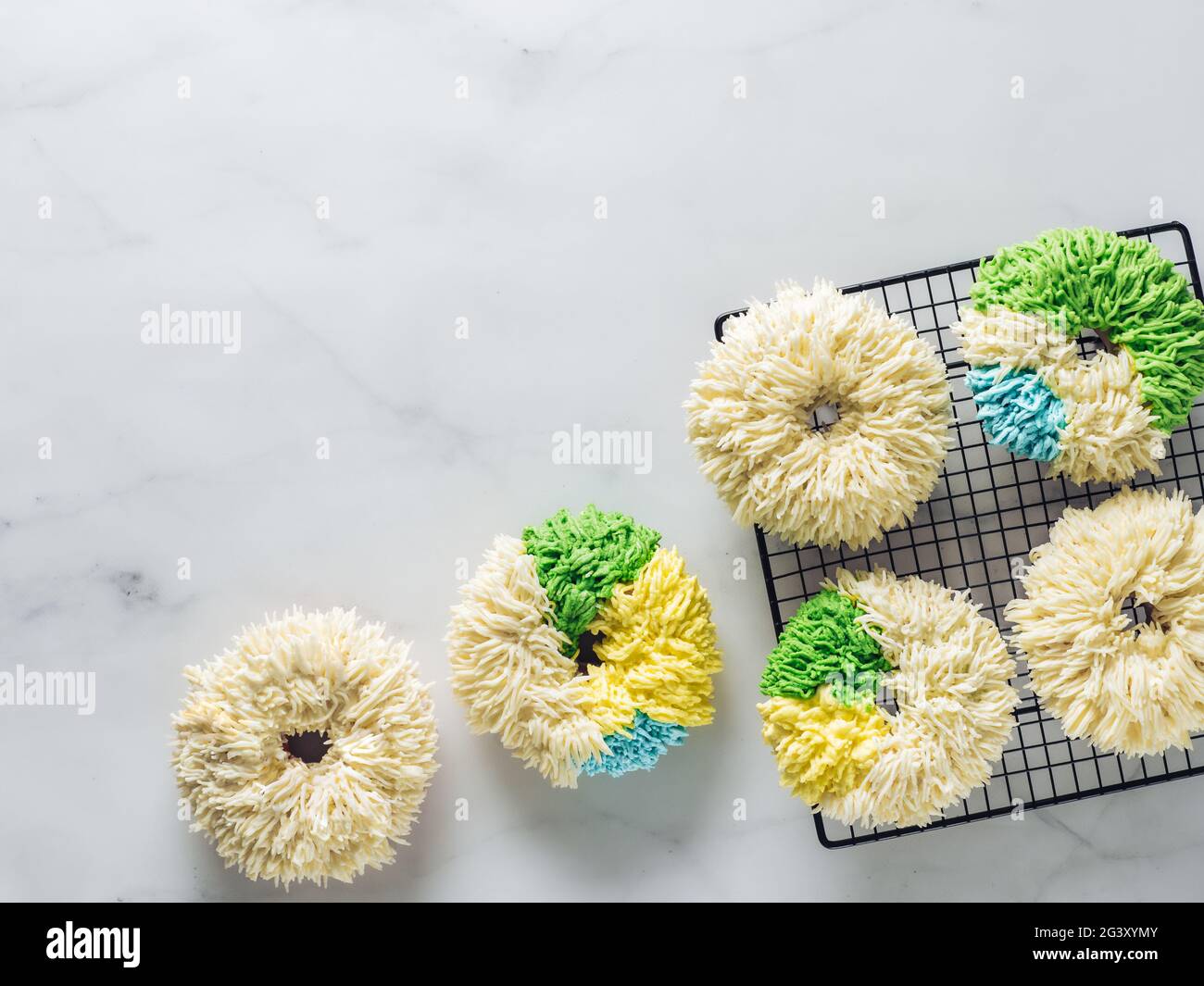 Shag donuts on marble background, copy space Stock Photo