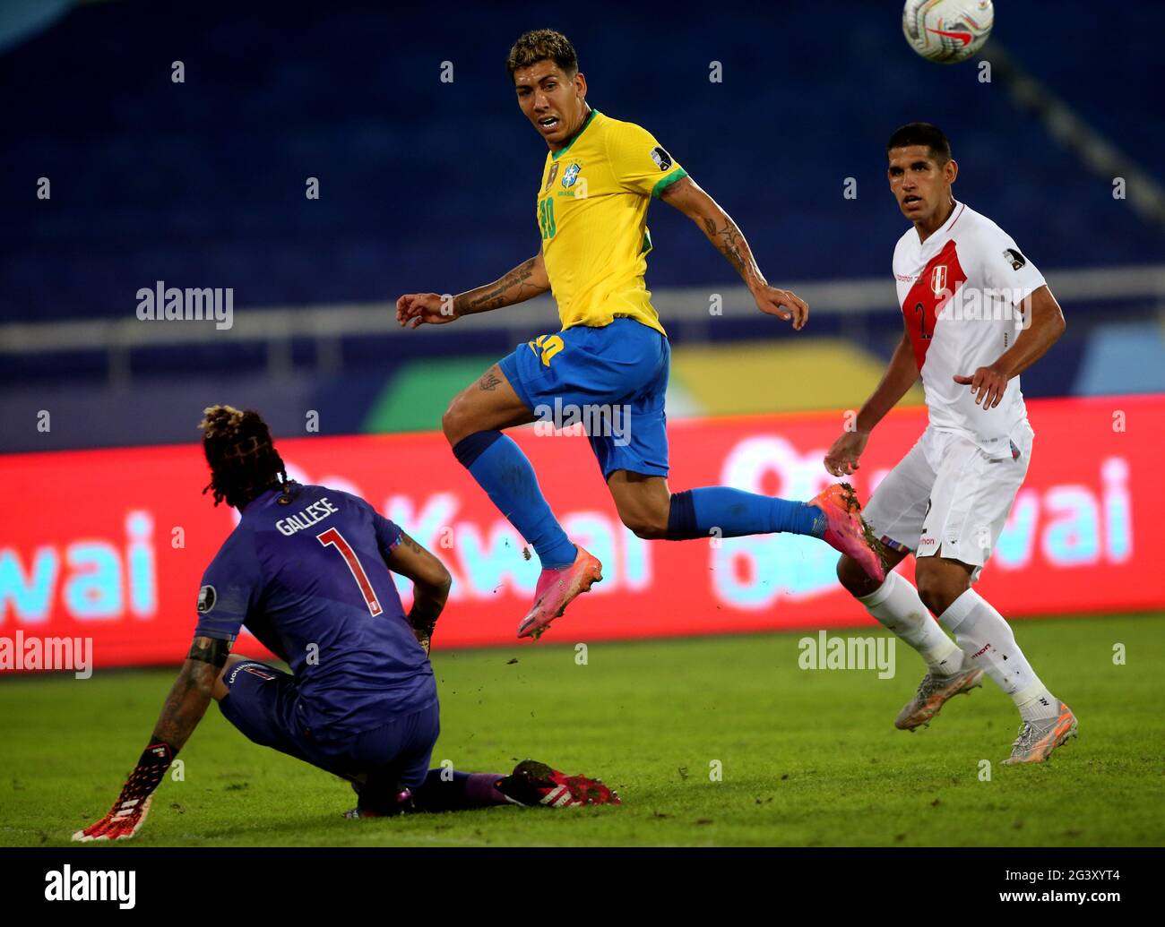 RIO DE JANEIRO, BRAZIL - JUNE 17: : Roberto Firmino of Brazil competes for the ball with Luis Abram and Pedro Gallese of Peru ,during the match between Brazil and Peru as part of Conmebol Copa America Brazil 2021 at Estadio Olímpico Nilton Santos on June 17, 2021 in Rio de Janeiro, Brazil. (Photo by MB Media) Stock Photo
