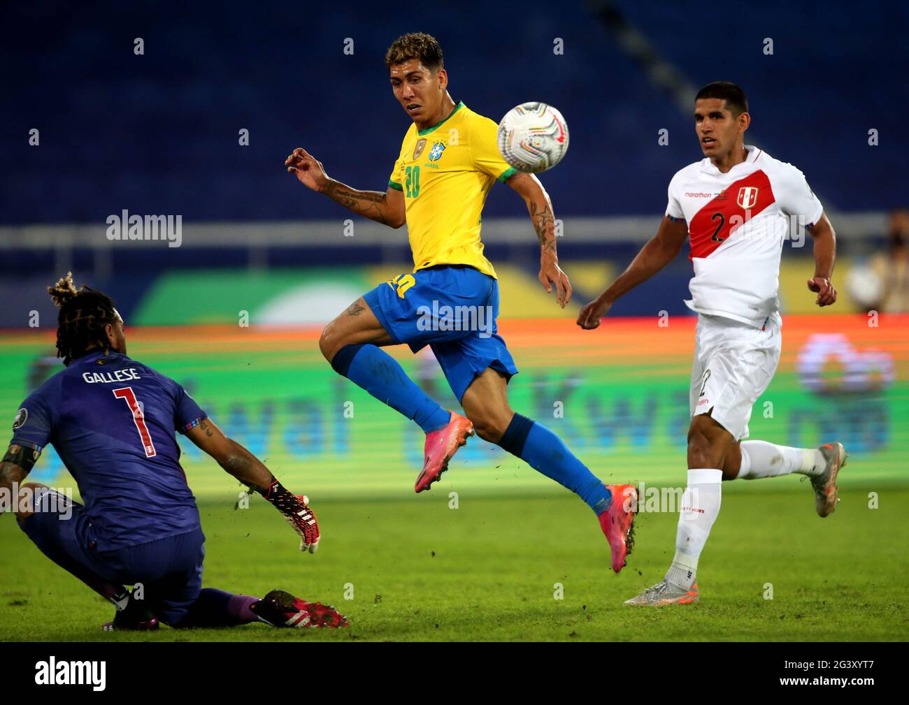 RIO DE JANEIRO, BRAZIL - JUNE 17: : Roberto Firmino of Brazil competes for the ball with Luis Abram and Pedro Gallese of Peru ,during the match between Brazil and Peru as part of Conmebol Copa America Brazil 2021 at Estadio Olímpico Nilton Santos on June 17, 2021 in Rio de Janeiro, Brazil. (Photo by MB Media) Stock Photo