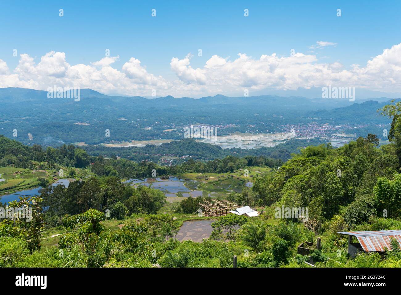View from the mountains over rice fields to Rantepao in Tana Toraja Stock Photo