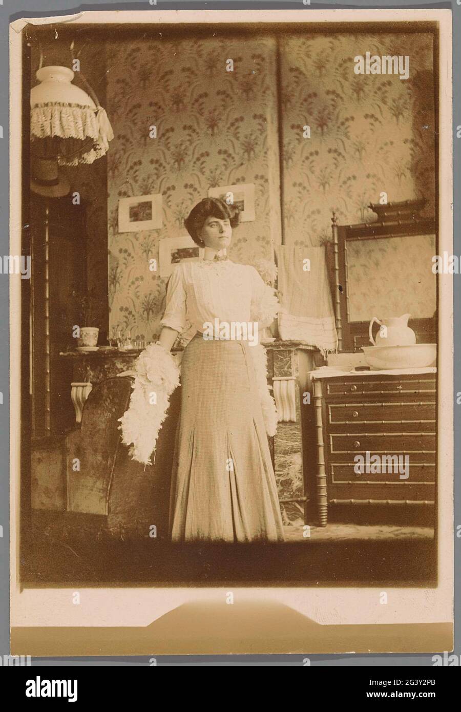 Portrait of woman in interior at sink in bamboo 'colonial' style Stock ...