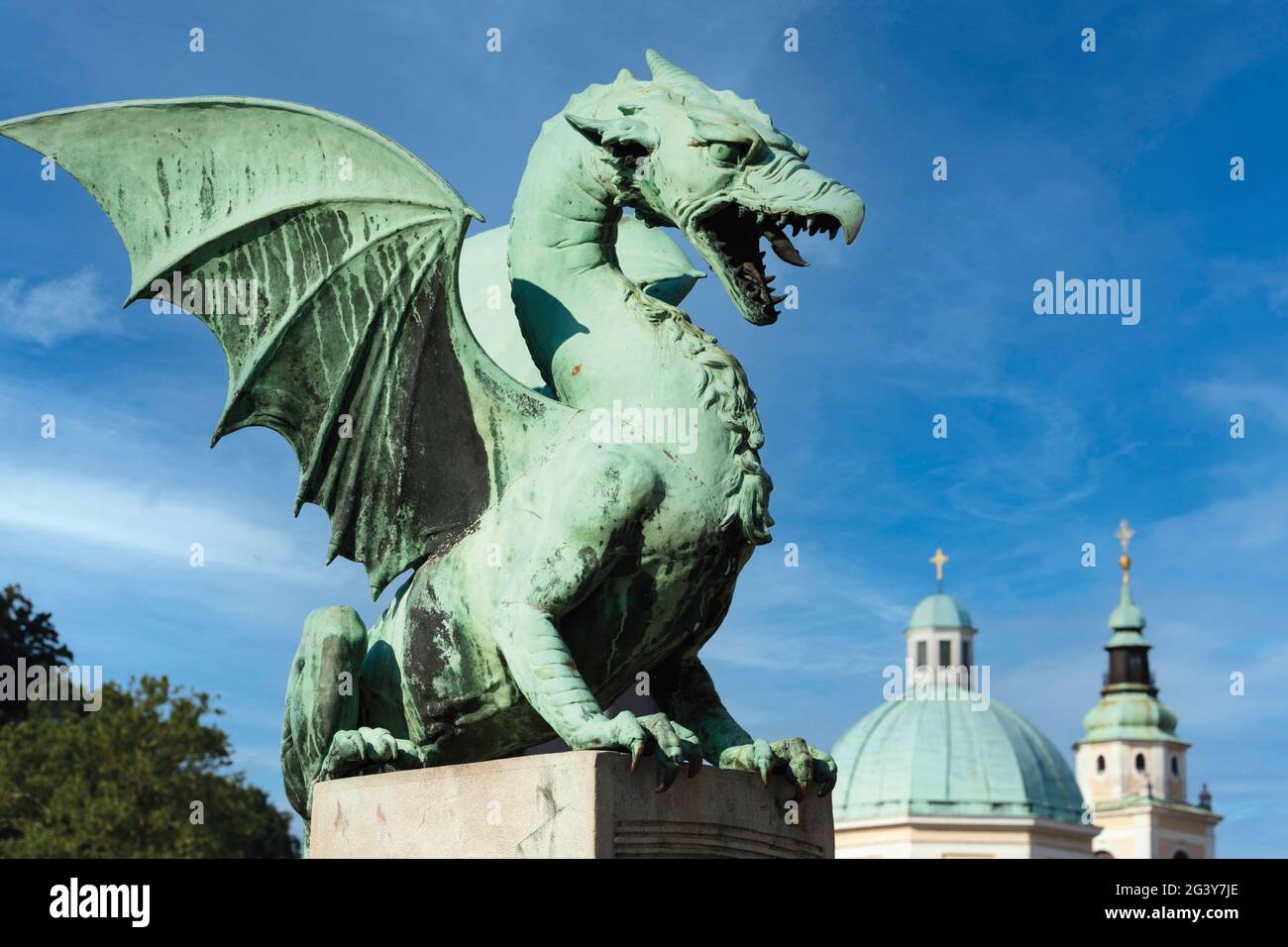 Ljubljana, Slovenia.  Bronze Dragon on the Art Nouveau Dragon Bridge. Stock Photo