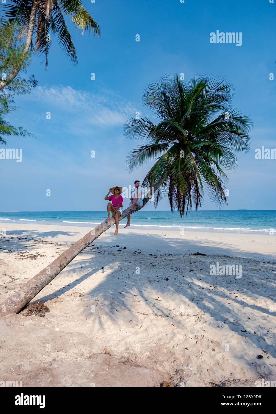 Couple on vacation in Thailand, Chumpon province , white tropical beach with palm trees, Wua Laen beach Chumphon area Thailand, Stock Photo