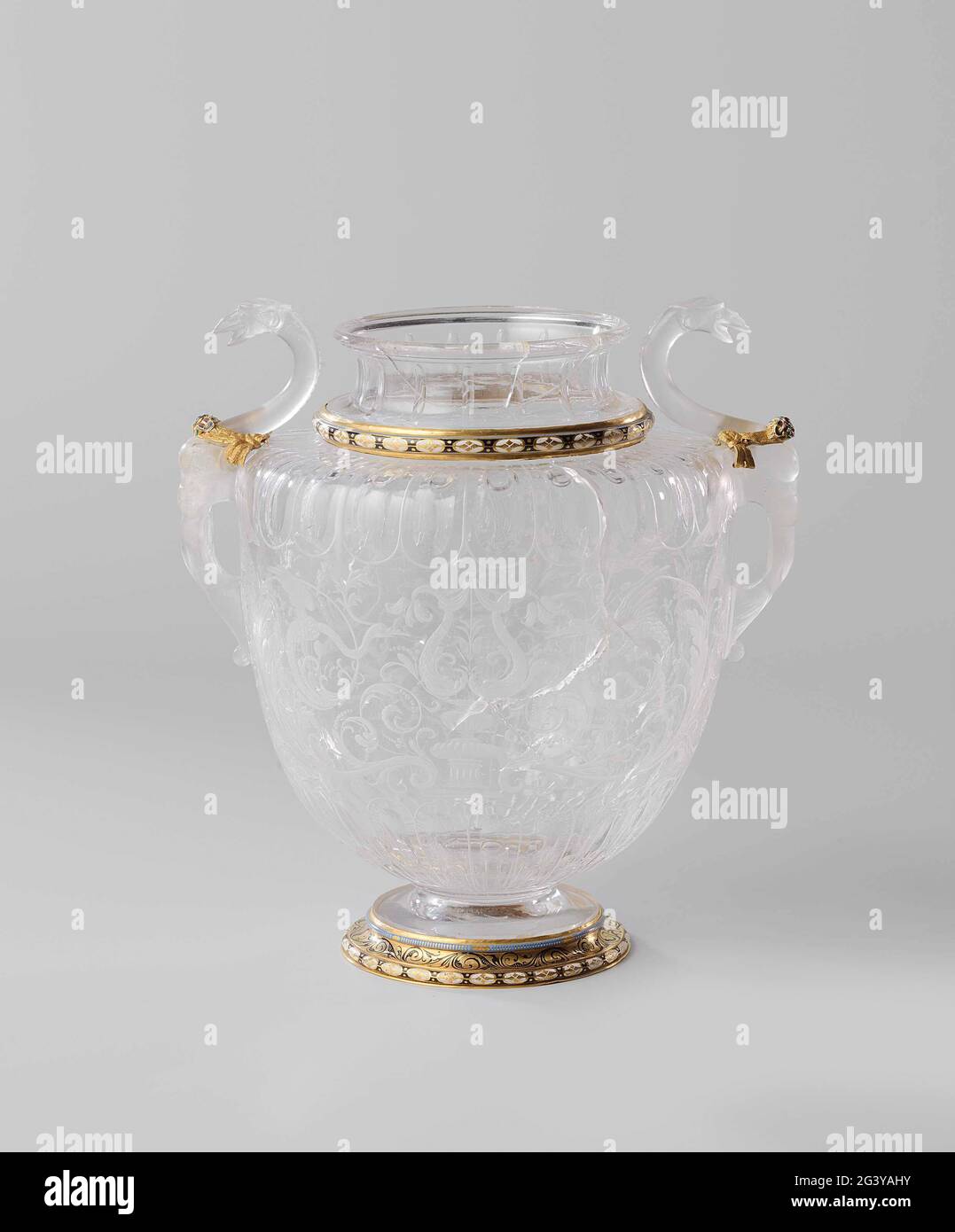Vase. The wall of this vase is decorated with foliate scrolls incorporating imaginary creatures such as dragons. The theme is continued in the handles, which are shaped like griffins. The decoration alludes to artefacts from Classical antiquity that were excavated around 1520. Stock Photo