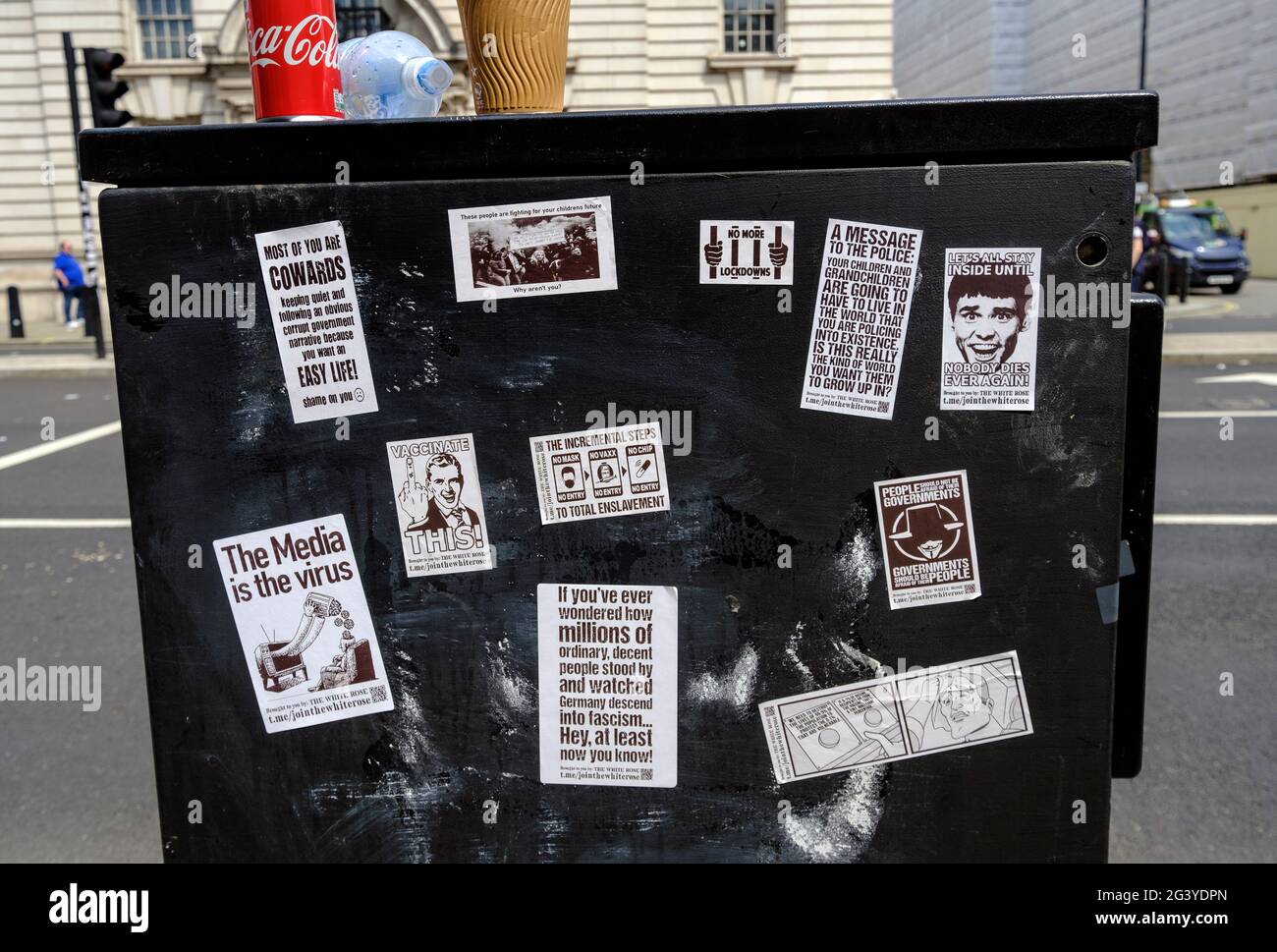 Anti- vax protesters put stickers all over London during an Anti-lockdown protest and demonstration in London May 2021 Stock Photo
