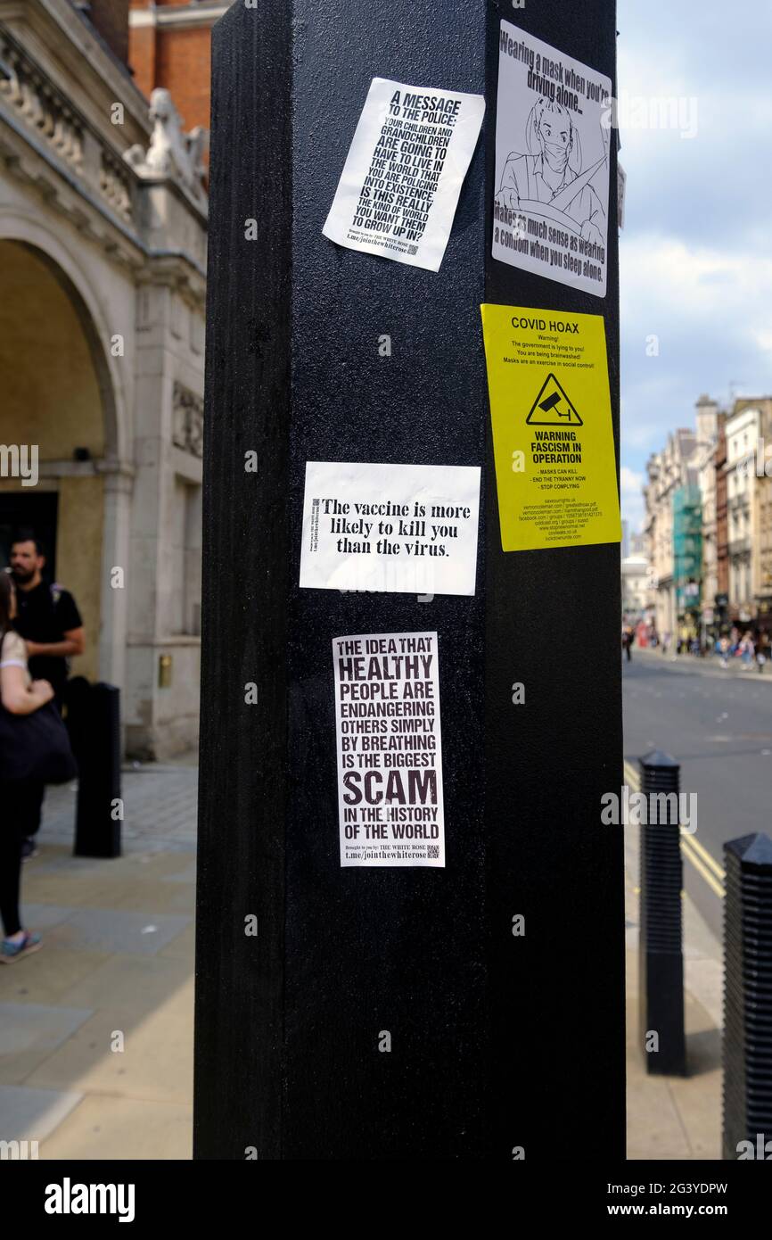 Anti- vax protesters put stickers all over London during an Anti-lockdown protest and demonstration in London May 2021 Stock Photo