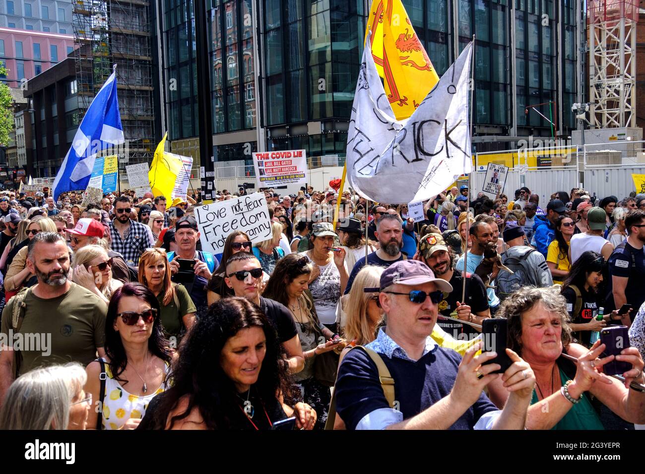 Anti-Vax anti-lockdown protesters march through central London protesting the governments Covid measures including vaccination passports and restrictions on opening lockdown.May 29 2021 Stock Photo