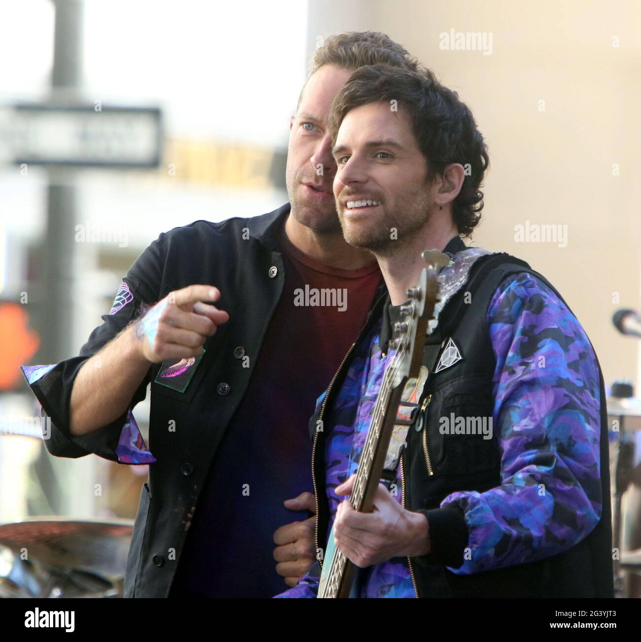 June 17, 2021. Chris Martin, Guy Berryman of Coldplay on Today Show Concert  Series at Rockfeller Plaza in New York June 17, 2021 Credit: RW/MediaPunch  Stock Photo - Alamy