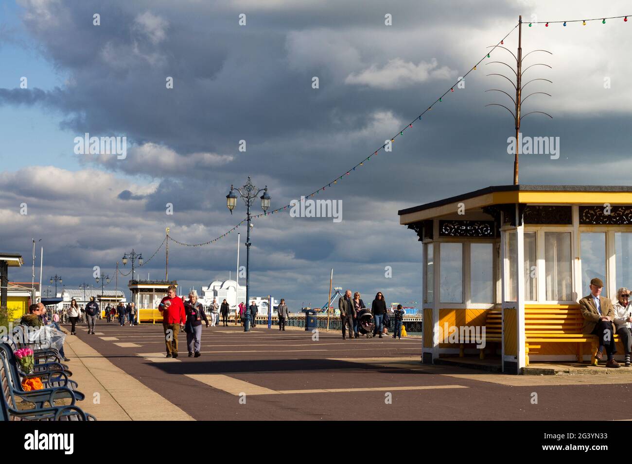 Southsea seafront, in October 2020, in the sunshine with people enjoying the sun during lockdown. Stock Photo