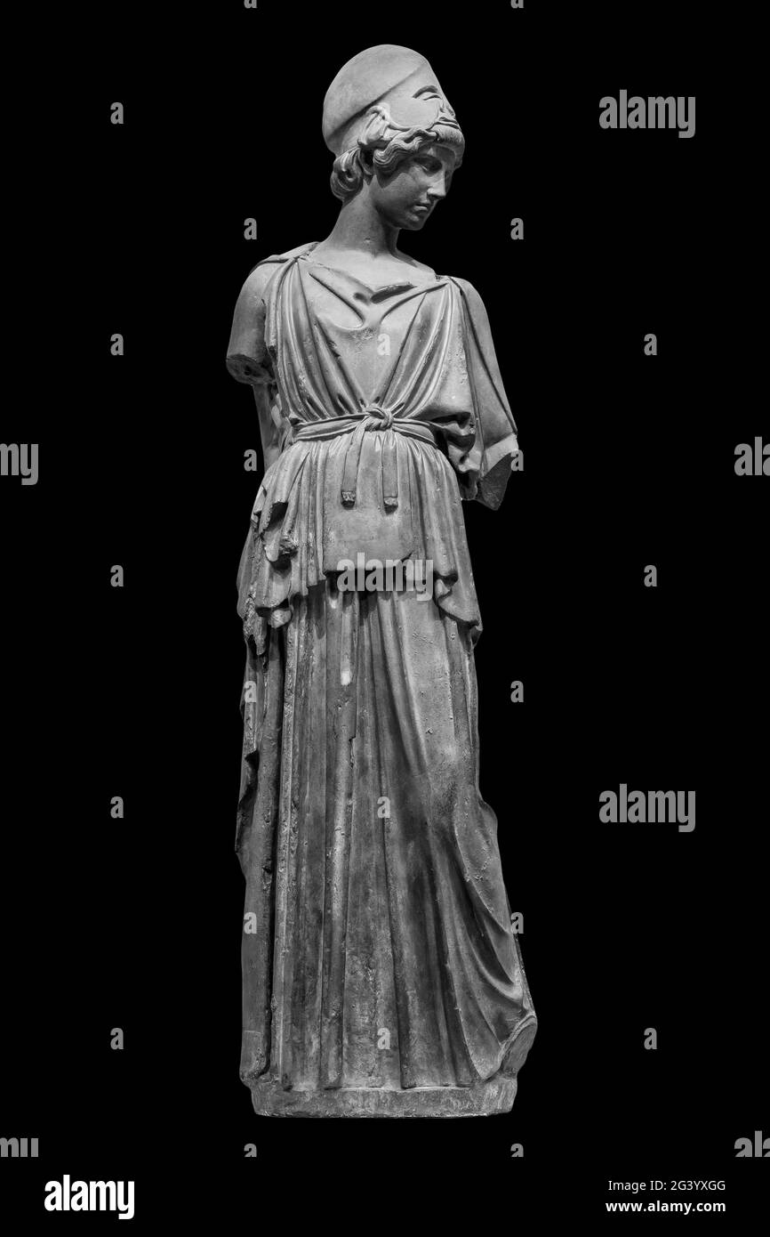Ancient Greek Roman statue of goddess Athena god of wisdom and the arts historical sculpture isolated on black. Marble woman in Stock Photo