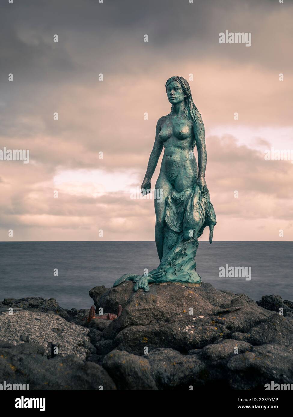 Statue of Kópakonan, mermaid in the village of Mikladalur on the island of Kalsoy, Faroe Islands Stock Photo