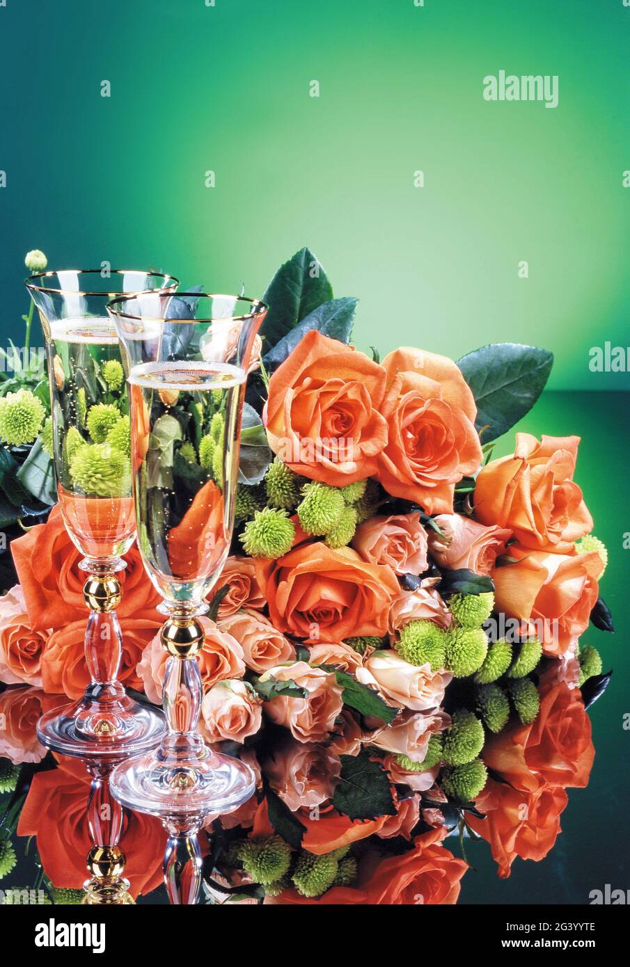 Still Life With Glasses And Flowers Stock Photo
