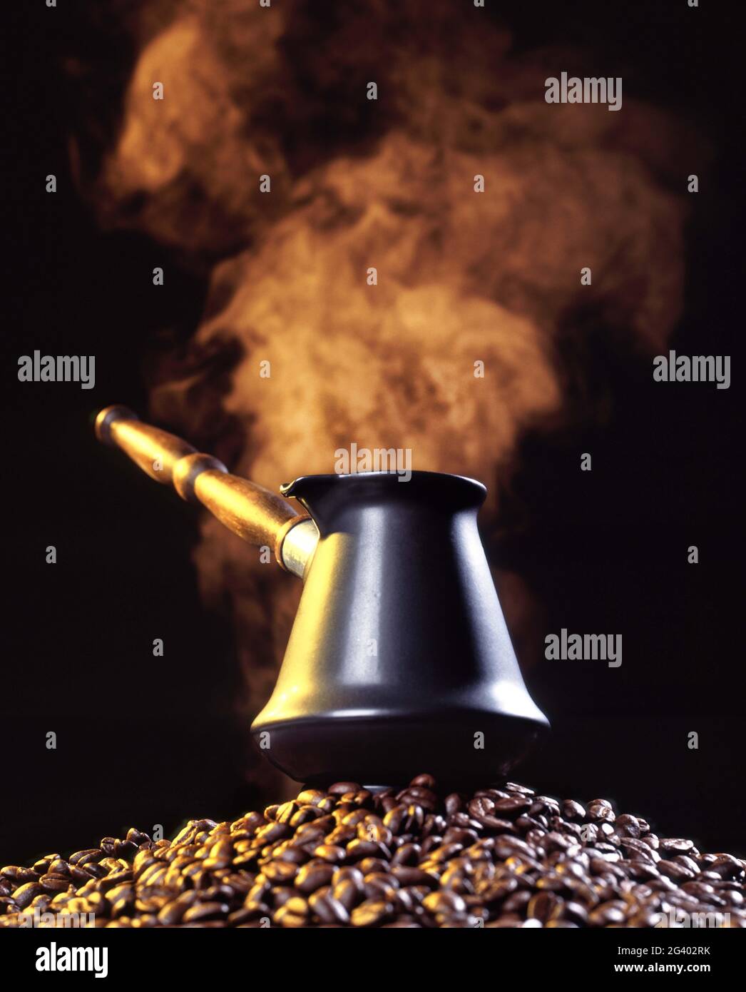Coffee Jug And Beans With Steam Stock Photo