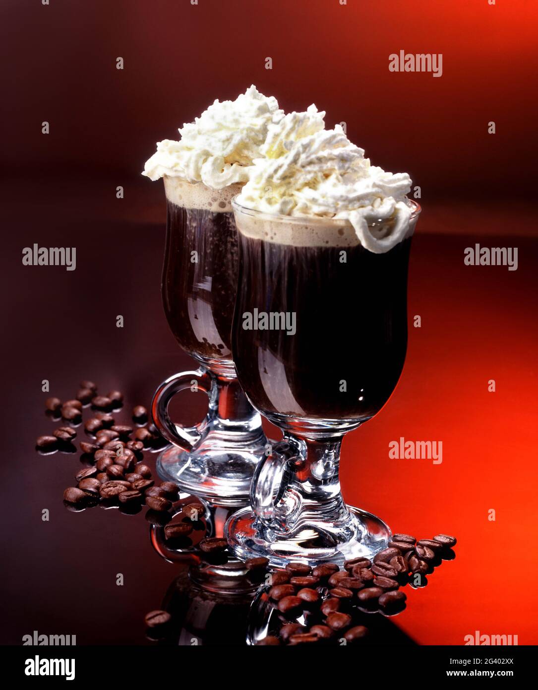 Glass Cups Of Coffee With Whipped Cream Stock Photo