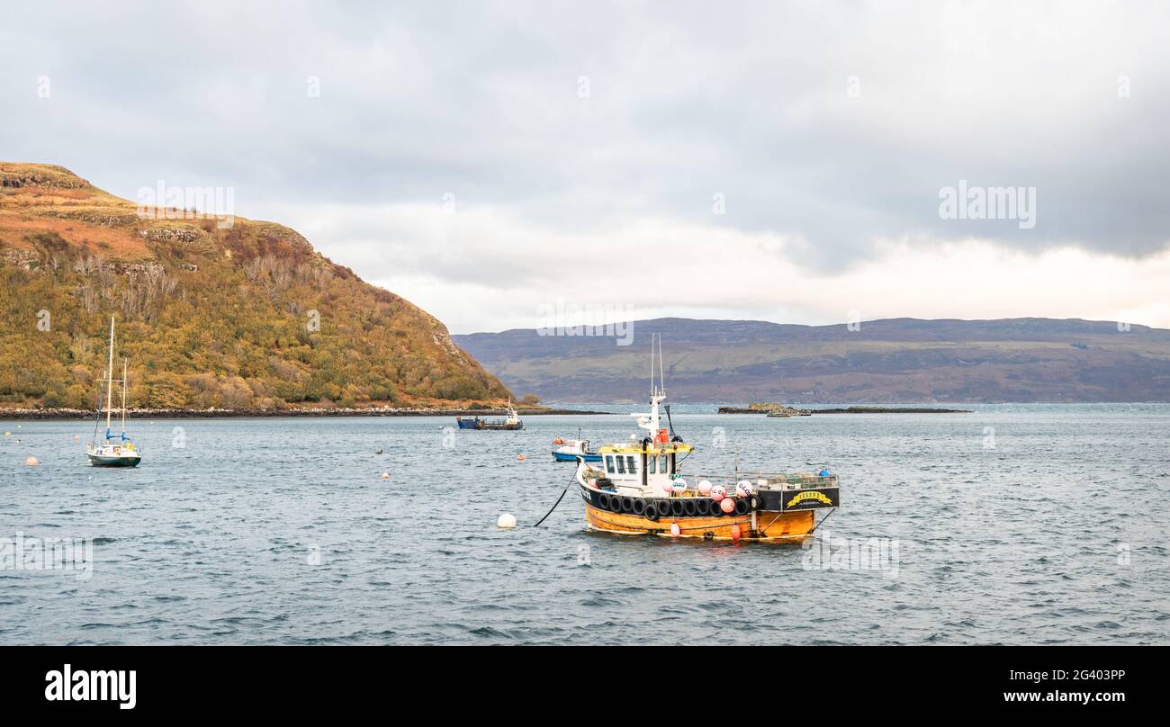 Fishing boat Serene moored in Portree Harbour, Portree, Isle of Skye, Scotland Stock Photo