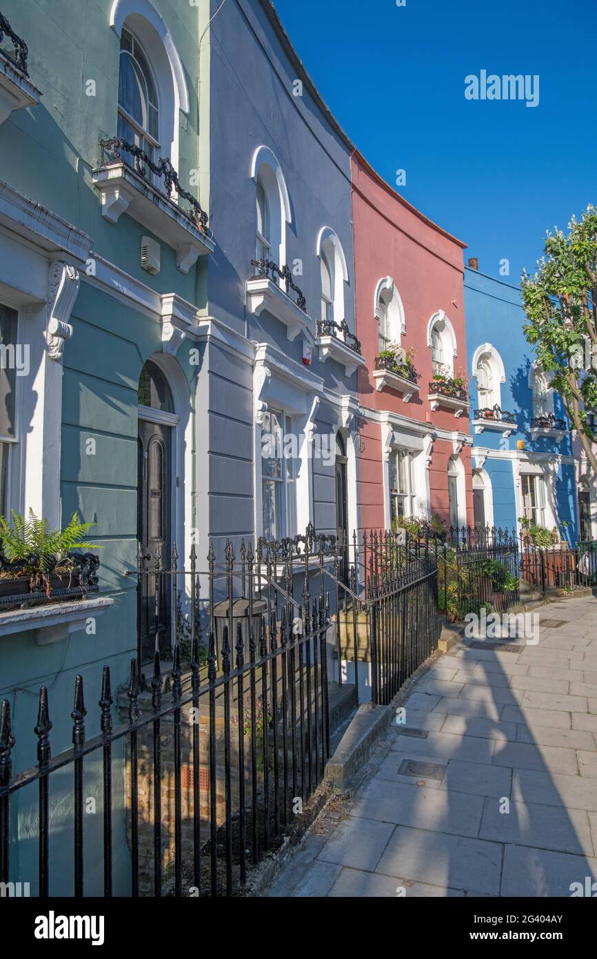 Colourful painted terraced houses Kelly Street Kentish Town London Stock Photo