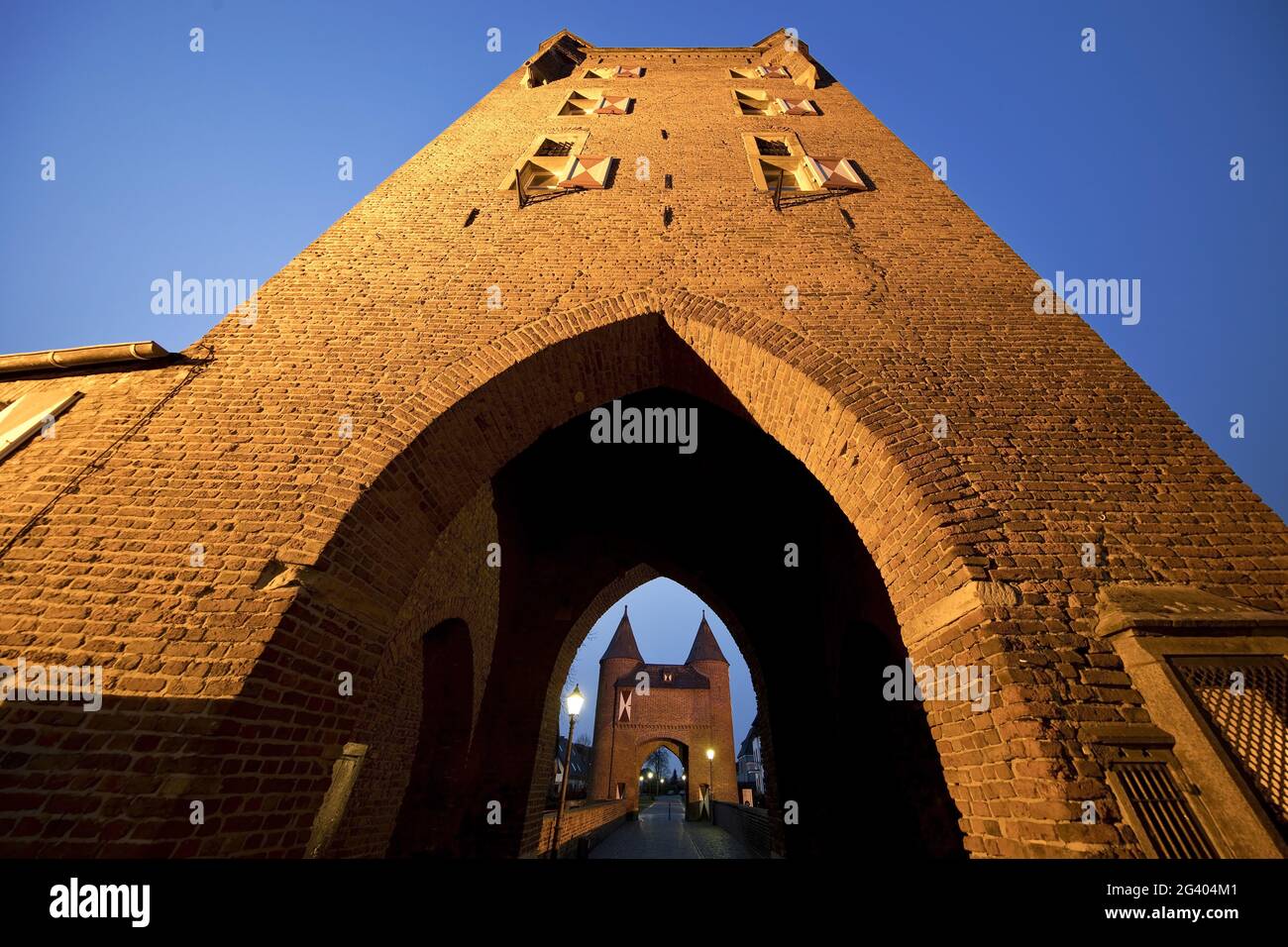 Klever Tor, view through the inside to the outer gate in the evening, Xanten, Germany, Europe Stock Photo