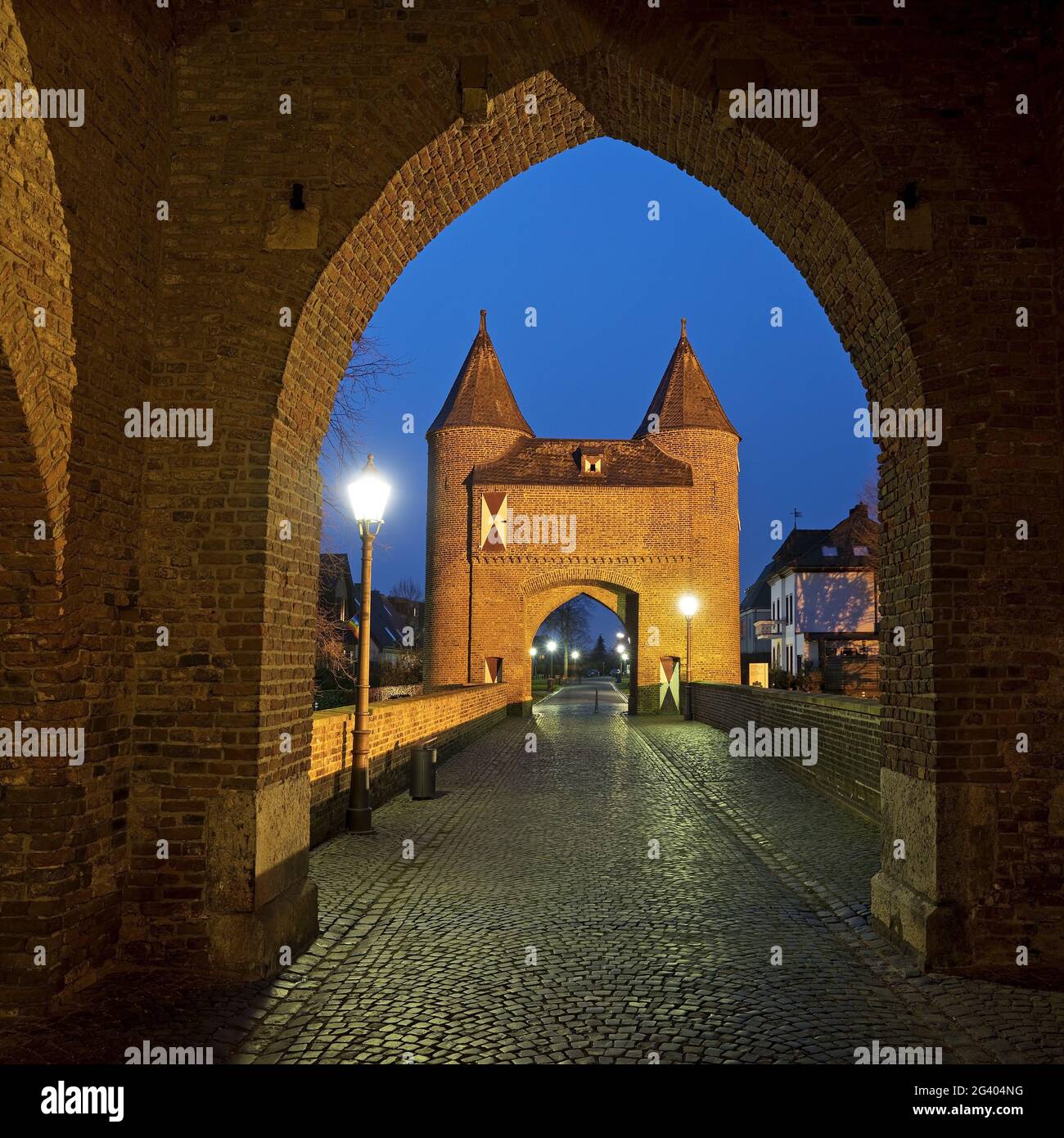Klever Tor, view through the inside to the outer gate in the evening, Xanten, Germany, Europe Stock Photo