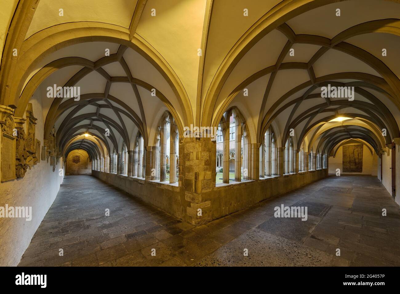 Illuminated cloister in the evening, St. Viktor Cathedral, Xanten, Lower Rhine, Germany, Europe Stock Photo