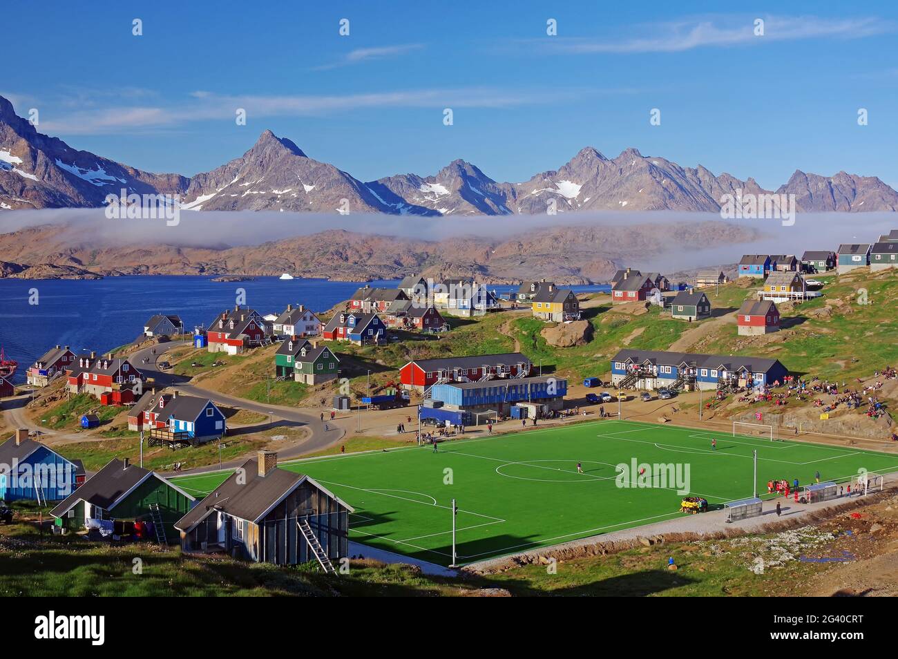 View over the sooccer field from Tasilaq Stock Photo
