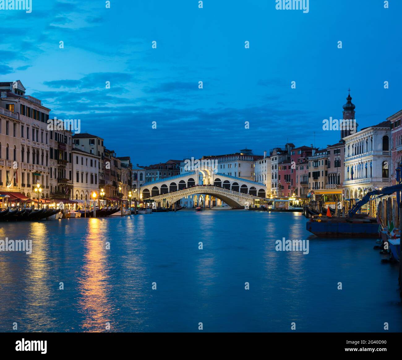 Night view of The Rialto Bridge on the Grand Canal in Venice,Italy. Stock Photo