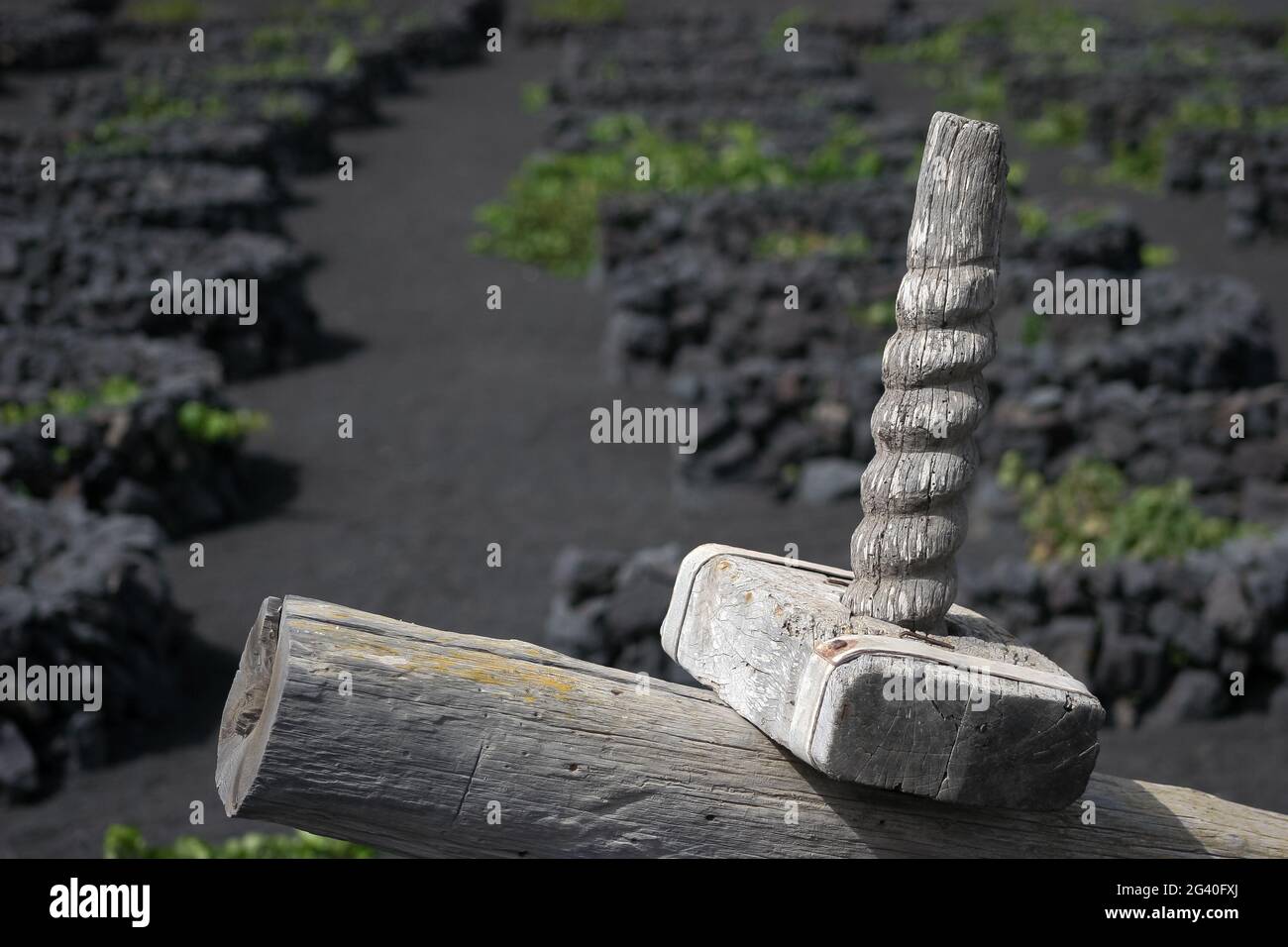 Partial view of an old wooden grape press in Lanzarote Stock Photo