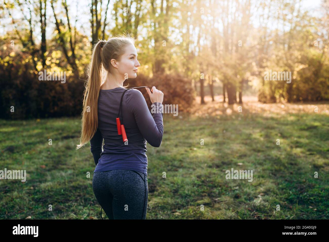 Slim blonde female rear view hi-res stock photography and images - Alamy