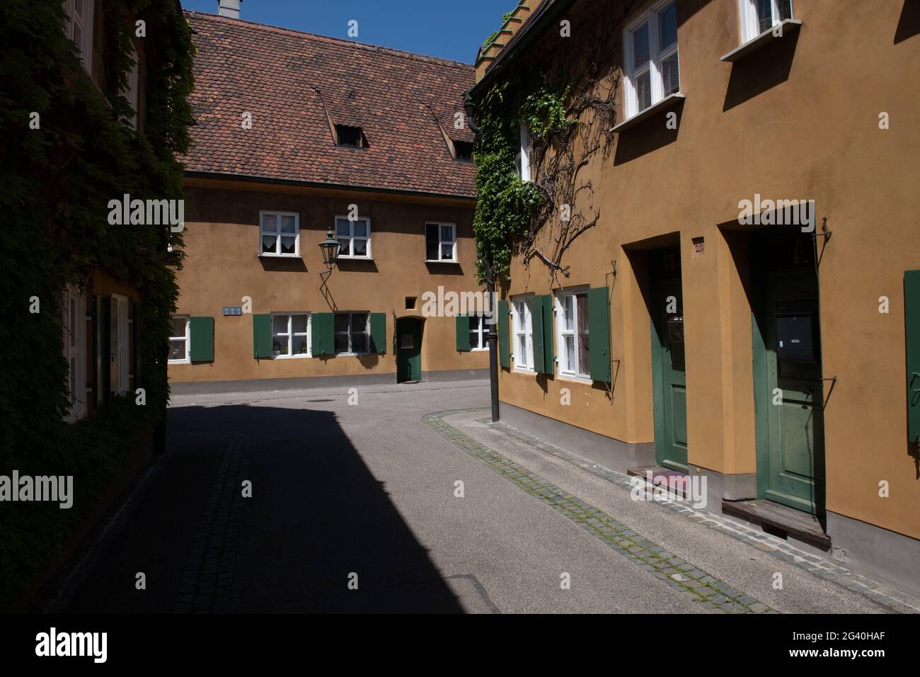 Augsburg, Germany. 18th June, 2021. The houses in the Fuggerei look