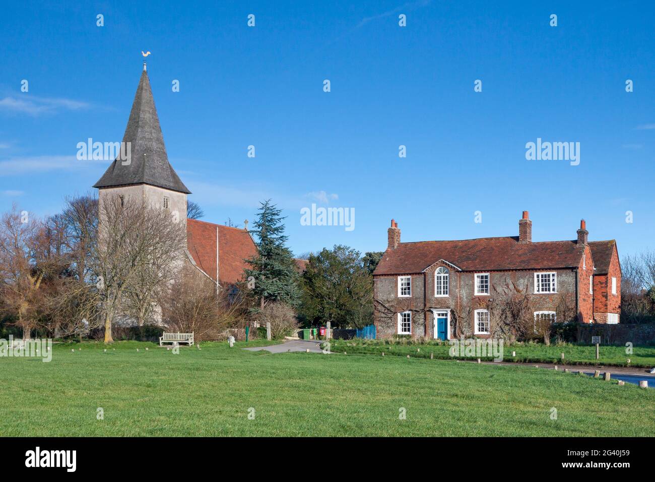 View across the green at Bosham Stock Photo Alamy
