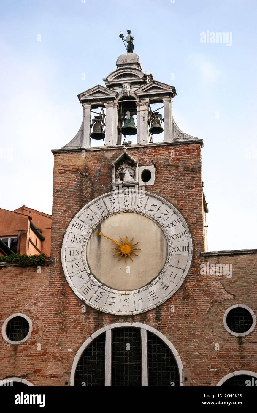 Sun clock on a building in Venice Stock Photo