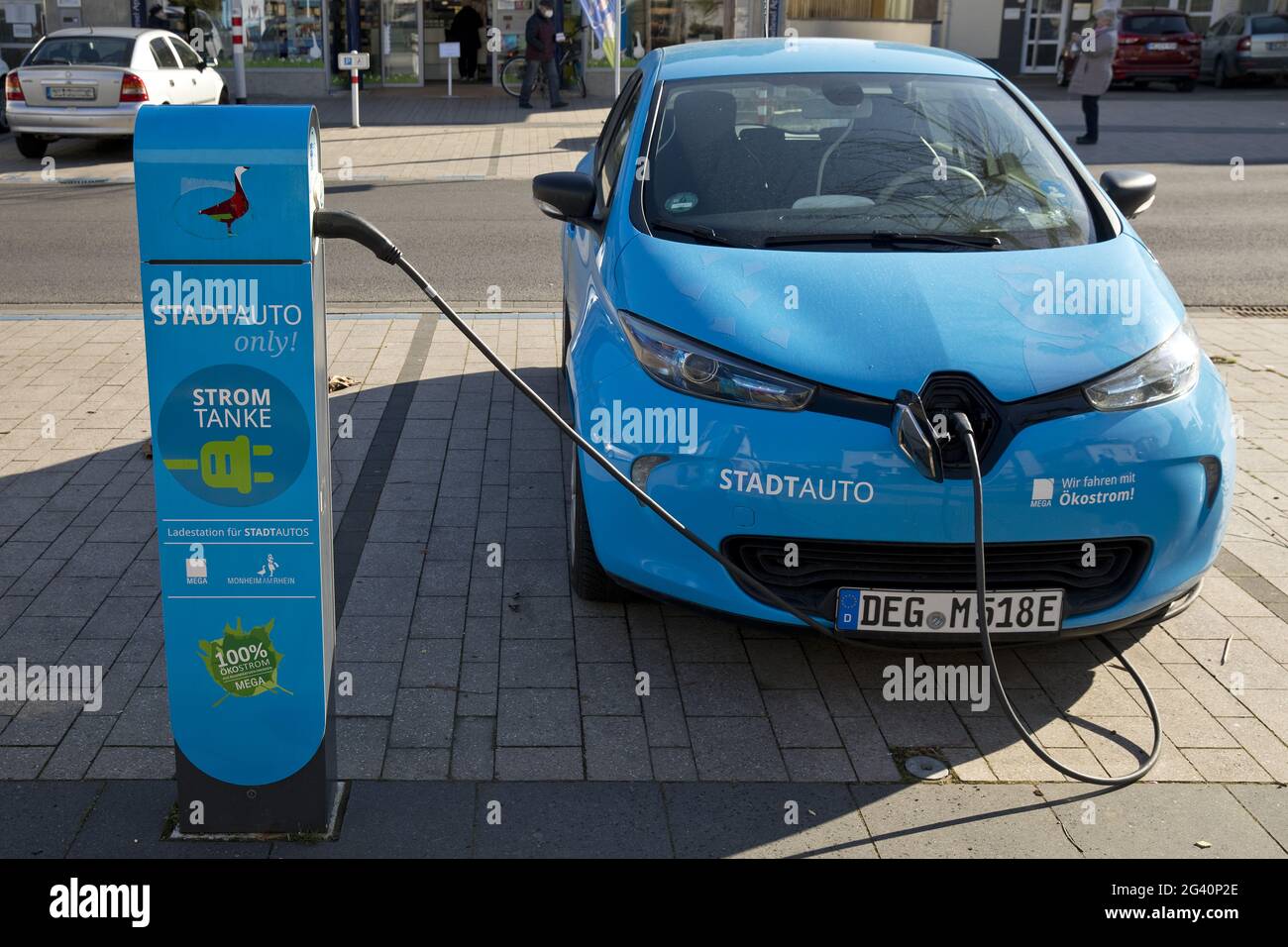 Electric car being charged as a city car for rent, Monheim am Rhein, North Rhine-Westphalia, Germany Stock Photo