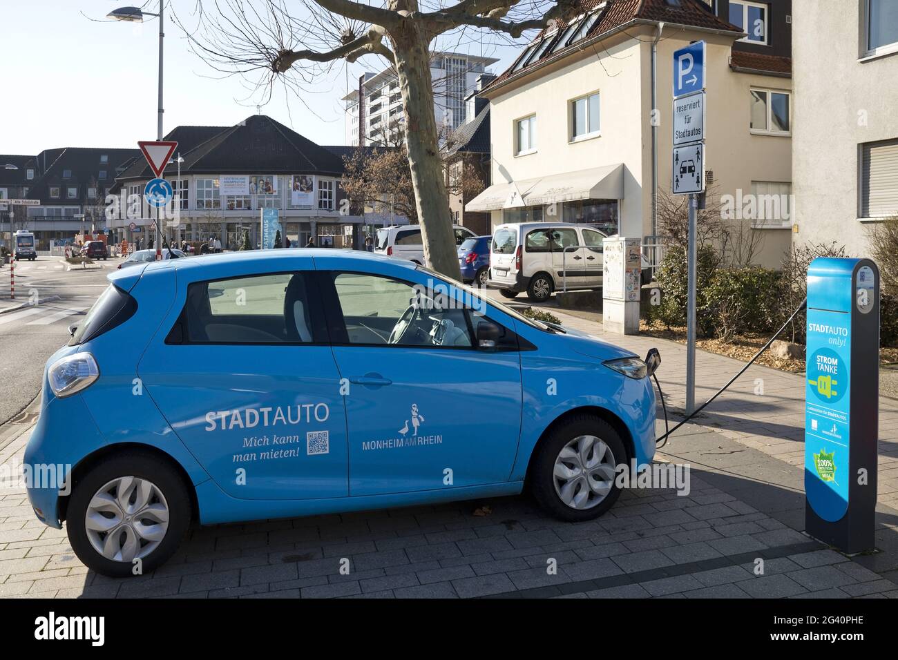Electric car being charged as a city car for rent, Monheim am Rhein, Germany, Europe Stock Photo