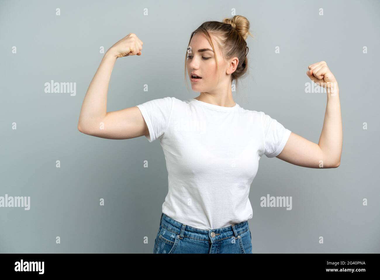 Portrait of Young Fitness Woman Shows Biceps Stock Image - Image of  athlete, athletic: 59823083